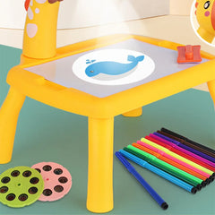 A table with a drawing projector for teaching children